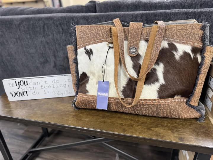 Brown and cream cow print textured tote bag